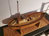 a model of a boat sitting on a table