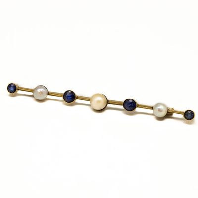 Broche barrette en or jaune 18 K (750/1000) ornée de 4 saphi…