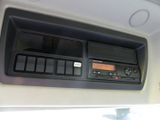 a radio in the center of a car ' s dash panel