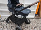 the stroller is empty and ready to be used in the room