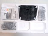 a picture of a computer keyboard and mouse in a box