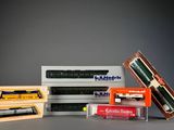 four different types of pencils and a box of pencils