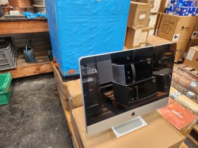 an image of a computer monitor sitting on top of a wooden table