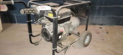 an image of a small water pump in a garage