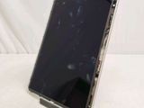 a picture of a tablet with a broken screen