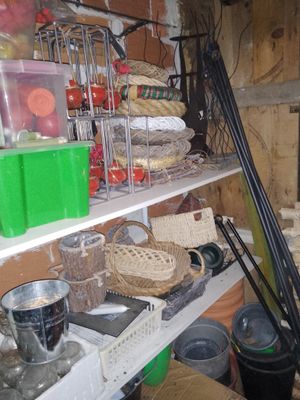 a shelf full of food and other items in a room