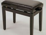 a black piano bench with a black seat on a white background