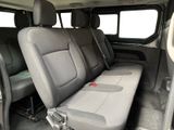 a seat in the back of a van with a bench in it