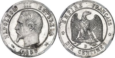 a close up of a silver coin with an eagle on it