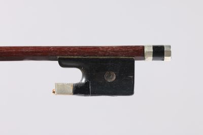 the bow of a violin with a wooden handle on a white background