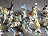 a lot of figurines that are sitting on a table