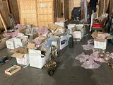a lot of boxes and boxes on the floor in a room