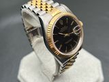 rolex watch with black dial and two tone gold bezel