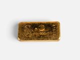 a gold bar on a white background