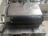 an image of a machine that is making doughs