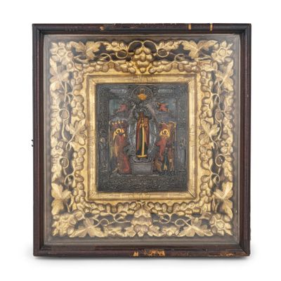 un vieux tableau représentant un homme et une femme, dans un cadre doré