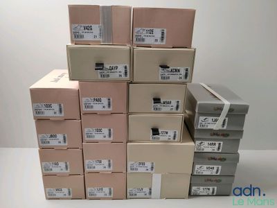 several boxes stacked on top of each other on a table