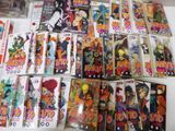 a lot of comic books that are on the table