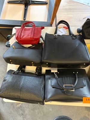 a lot of bags that are sitting on a table