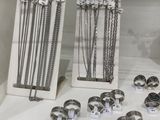many different types of jewelry displayed on display in a glass case