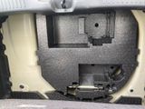 a close up of the inside of a car ' s trunk