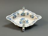 an image of a blue and white bowl with flowers on it