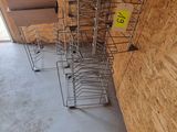 several shopping carts are lined up against a wall in a store