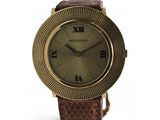 an image of a close up of a wrist watch with roman numerals