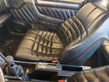 an image of a car with leather seats and a console