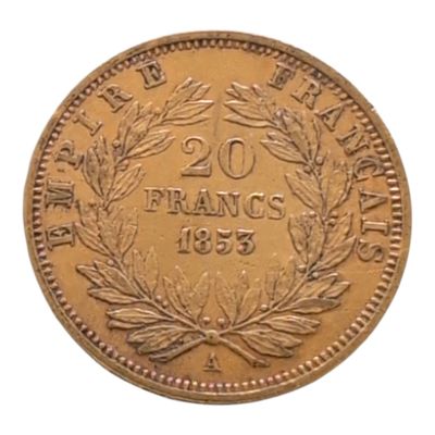 un gros plan d'une pièce de monnaie ornée d'une couronne