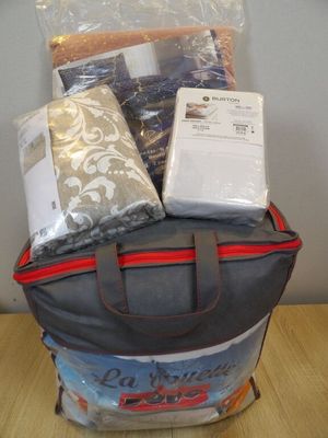 a bag of items sitting on top of a wooden table