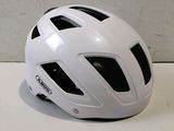 a close up of a white helmet on a table