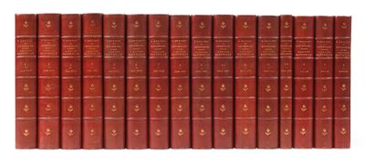a row of red books sitting on top of each other