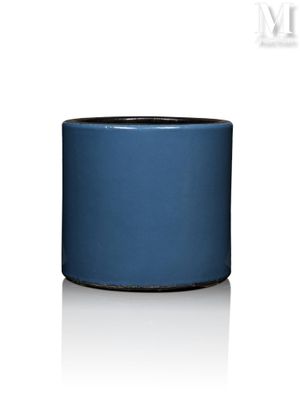 an image of a blue vase on a white surface