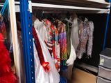 a closet with a lot of clothes on it