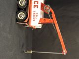 a toy truck that is sitting on top of a table