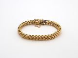 a gold chain bracelet with a clasp on a white background