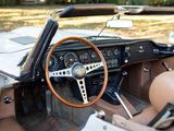 a white car with a brown leather seat and dashboard