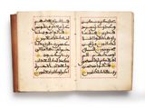 an open book with arabic writing on it