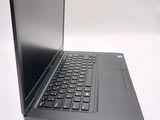 a laptop computer that is sitting on a table
