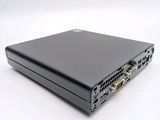 the back of a black laptop computer sitting on top of a white surface