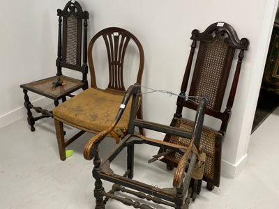 three chairs that are sitting next to each other in a room