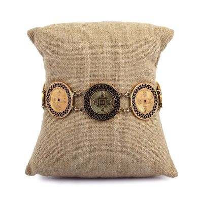 a close up of a pillow with buttons on it