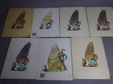 six children ' s books with illustrations of a mouse and a man on a rock