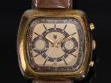an image of a close up of a watch on a black background