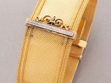 an 18k yellow gold bracelet with a diamond clasp