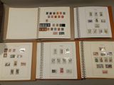 many different types of stamps on the pages of a book