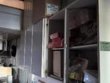 a room with a bunch of boxes and boxes on the floor