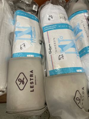 many rolls of toilet paper wrapped in plastic bags