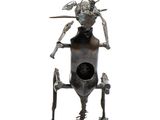 statue of a man with a bird on his head and a sword in his hand